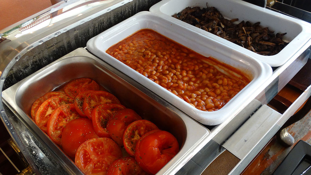 Park Inn by Radisson, breakfast baked beans, mushrooms, and tomato