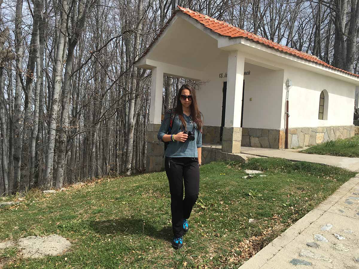 Ellie in front of one of the chapels on the Cross Forest