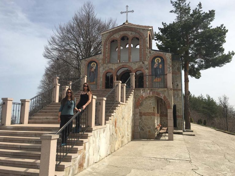 Nina and Ellie in front of the Holy Trinity church