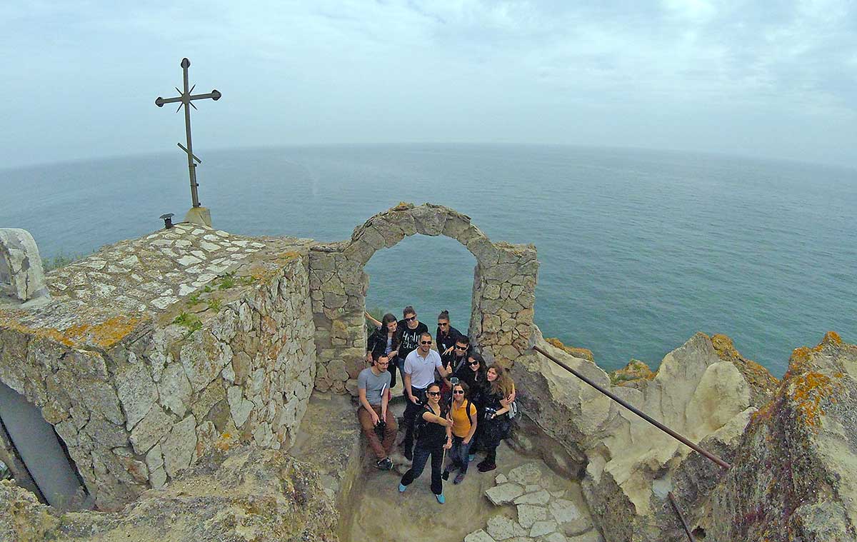 ASTOM team next to the chapel of St. Nicholas